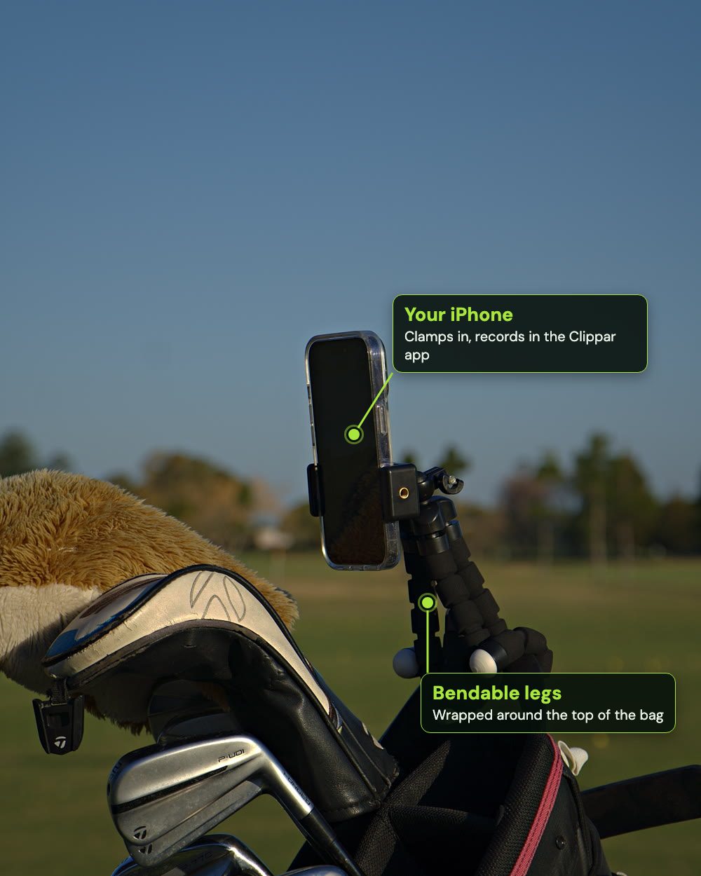 The Clippar phone holder on a golf bag, labelled: the iPhone clamp and the bendable legs